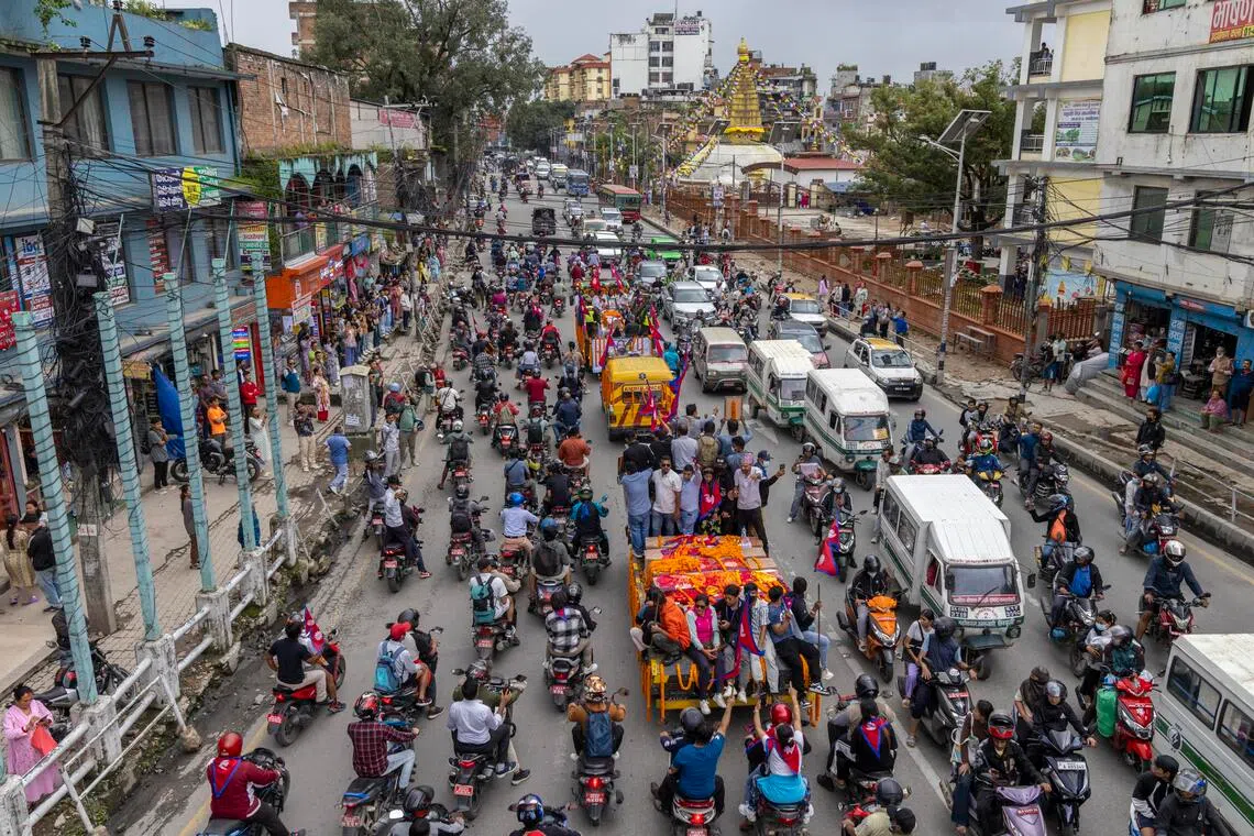 People participate in a tribute rally for the people who died during the Gen-Z protest in Kathmandu, Nepal, on Sept 16, 2025.