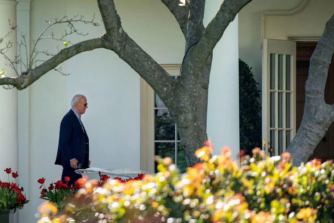 FILE PHOTO: U.S. President Joe Biden walks to the Oval Office at the White House in Washington, U.S., April 13, 2024.   REUTERS/Bonnie Cash/File Photo