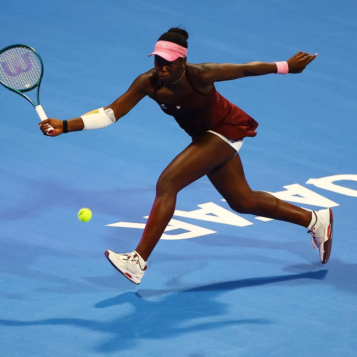 Tennis - WTA 1000 - Qatar Open - International Tennis and Squash complex, Doha, Qatar - February 12, 2026 Canada's Victoria Mboko in action during her quarter final match against Kazakhstan's Elena Rybakina REUTERS/Ibraheem Al Omari