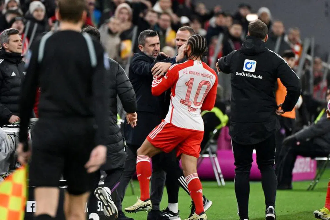 FILE PHOTO: Soccer Football - Bundesliga - Bayern Munich v 1. FC Union Berlin - Allianz Arena, Munich, Germany - January 24, 2024 1. FC Union Berlin coach Nenad Bjelica clashes with Bayern Munich's Leroy Sane before being shown a red card by referee Frank Willenborg REUTERS/Angelika Warmuth/File Photo