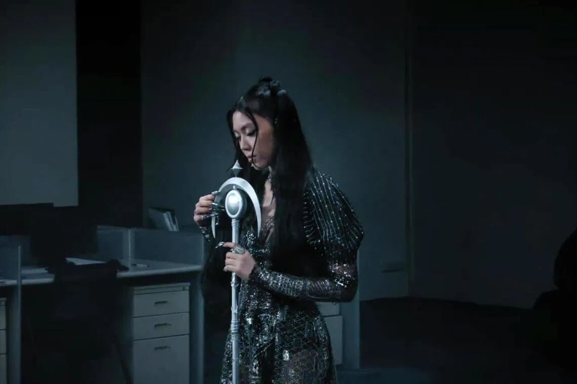 Musician Jasmine Sokko with a 3D-printed Sailor Moon-inspired microphone stand.