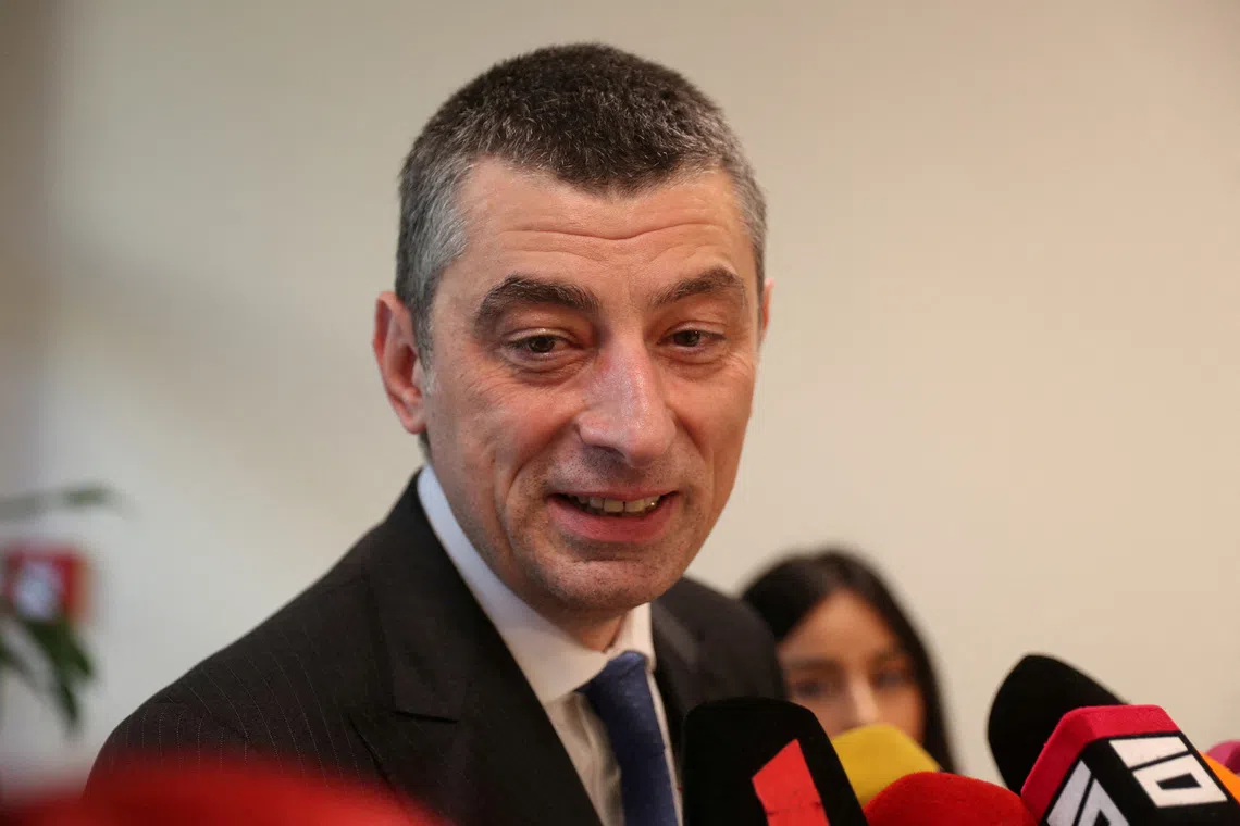 FILE PHOTO: Giorgi Gakharia, chairman of the opposition political party \"For Georgia\", speaks to the media after a meeting with Georgian President Salome Zourabichvili in Tbilisi, Georgia October 9, 2024. REUTERS/Irakli Gedenidze/File Photo