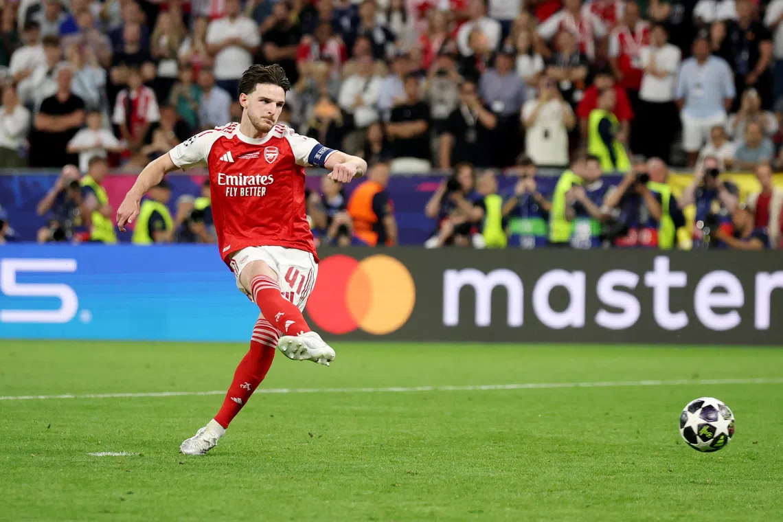 Soccer Football - UEFA Champions League - Final - Paris St Germain v Arsenal - Puskas Arena, Budapest, Hungary - May 30, 2026 Arsenal's Declan Rice scores a penalty during the shoot-out REUTERS/Phil Noble
