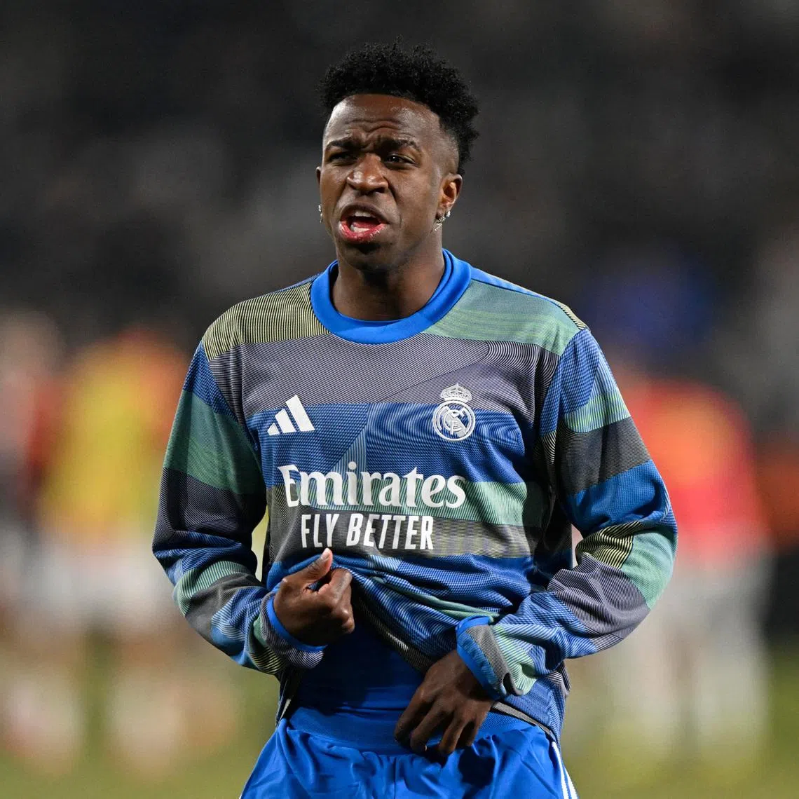 Soccer Football - Copa del Rey - Round of 16 - Albacete v Real Madrid - Estadio Carlos Belmonte, Albacete, Spain - January 14, 2026 Real Madrid's Vinicius Junior during the warm up before the match REUTERS/Pablo Morano