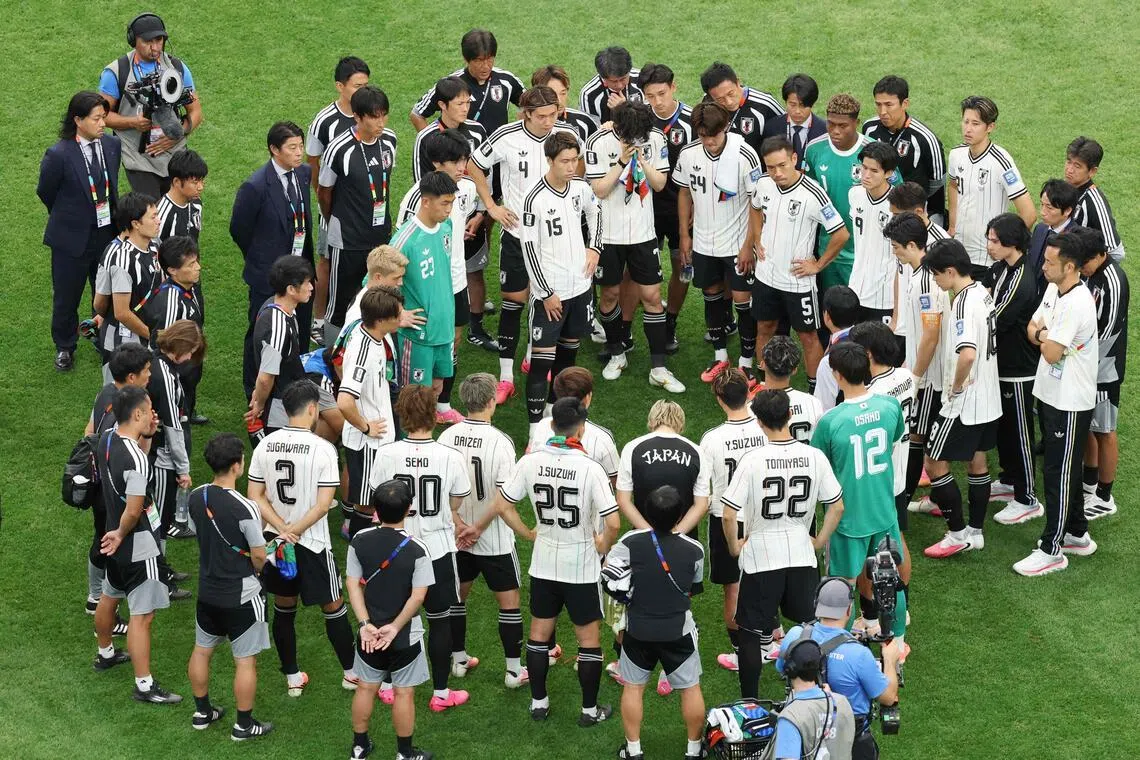 HOUSTON, TEXAS - JUNE 29: Japan players huddle after the 1-2 loss during the FIFA World Cup 2026 Round Of 32 match between Brazil and Japan at Houston Stadium on June 29, 2026 in Houston, Texas.   Molly Darlington/Getty Images/AFP (Photo by Molly Darlington / GETTY IMAGES NORTH AMERICA / Getty Images via AFP)