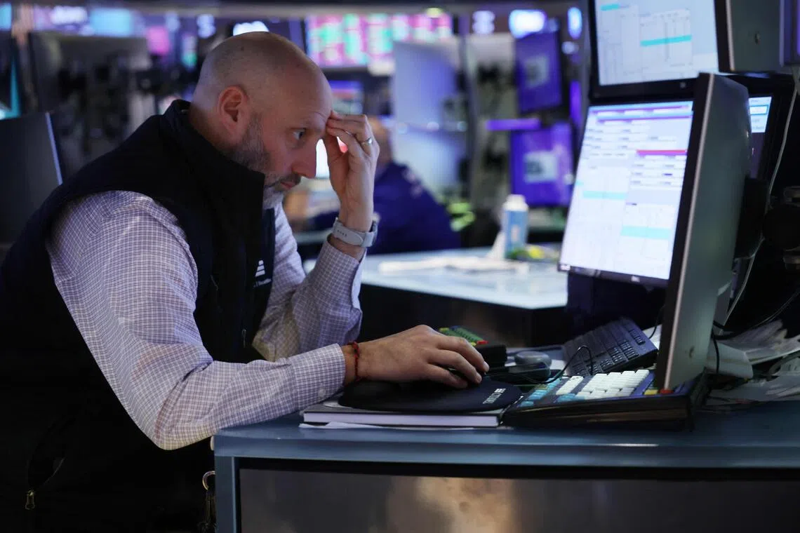 Wall Street tumbles as Nvidia slides, investors fret that Fed may slow rate cuts