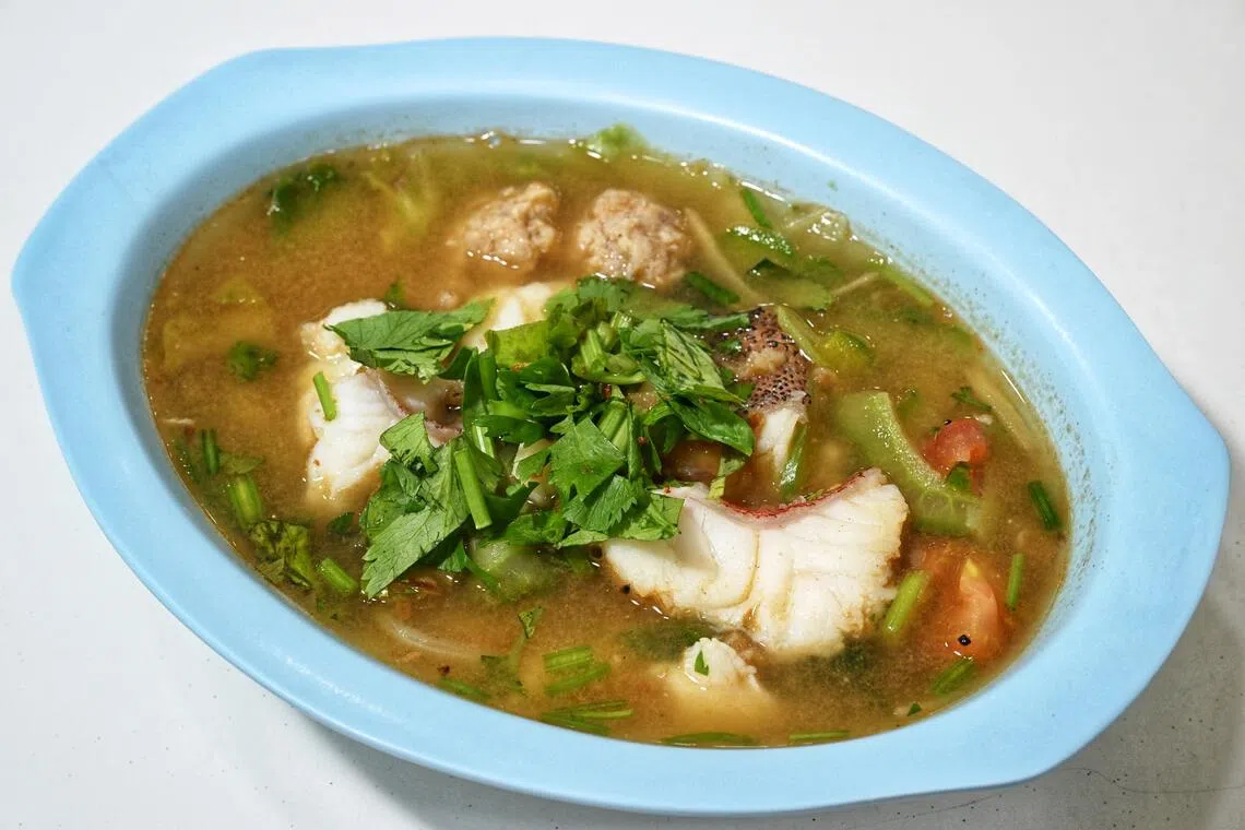 Sliced Red Grouper Soup at Boon Keng Road Fish Head Bee Hoon stall, situated at the Lau Ka Kopitiam.