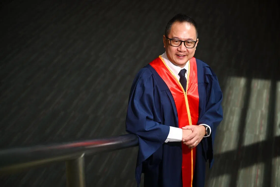 ST20250709_202522800460 Azmi Athni ssteach09//

Mr David Lee, a deaf teacher, at the Teachers? Investiture Ceremony 2025 at Nanyang Technological University on July 9, 2025. 

ST PHOTO: AZMI ATHNI