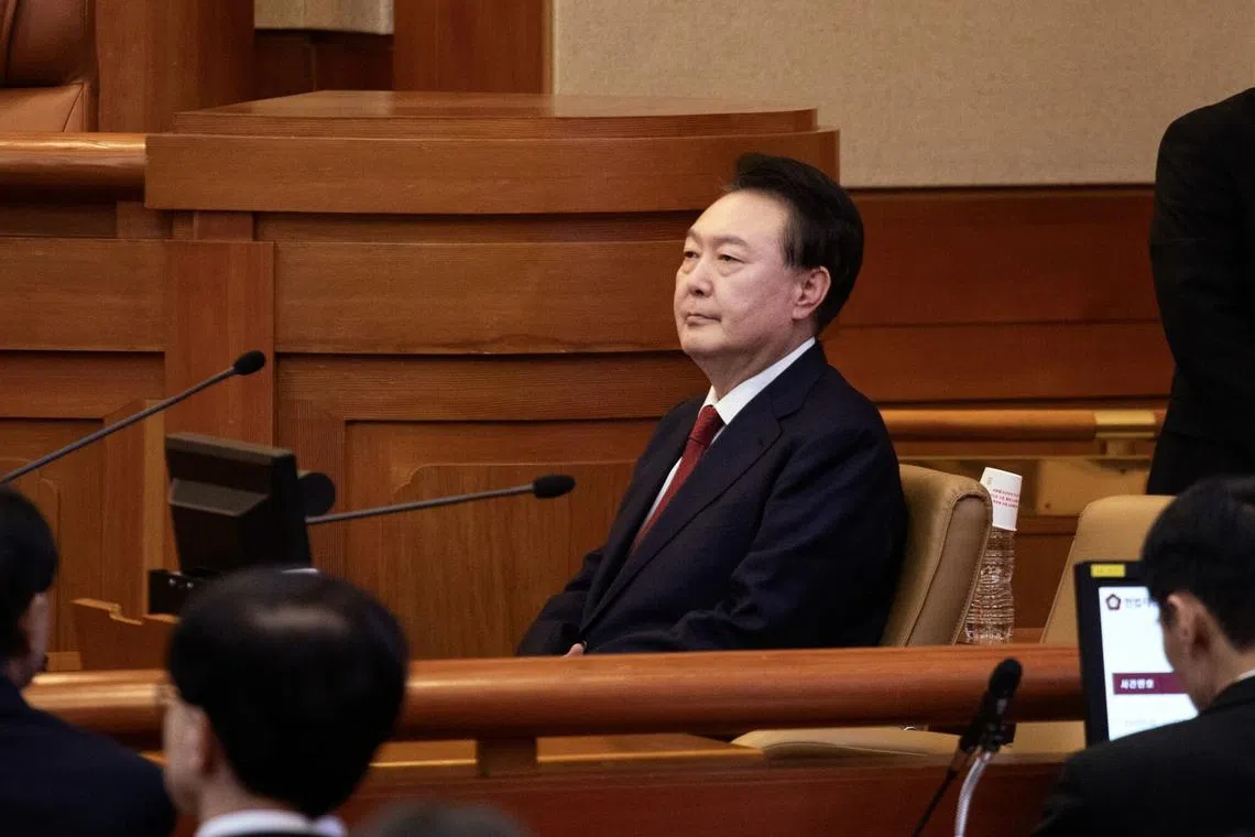 Impeached South Korean President Yoon Suk Yeol attends a hearing at the Constitutional Court of Korea in Seoul, on Jan 21.