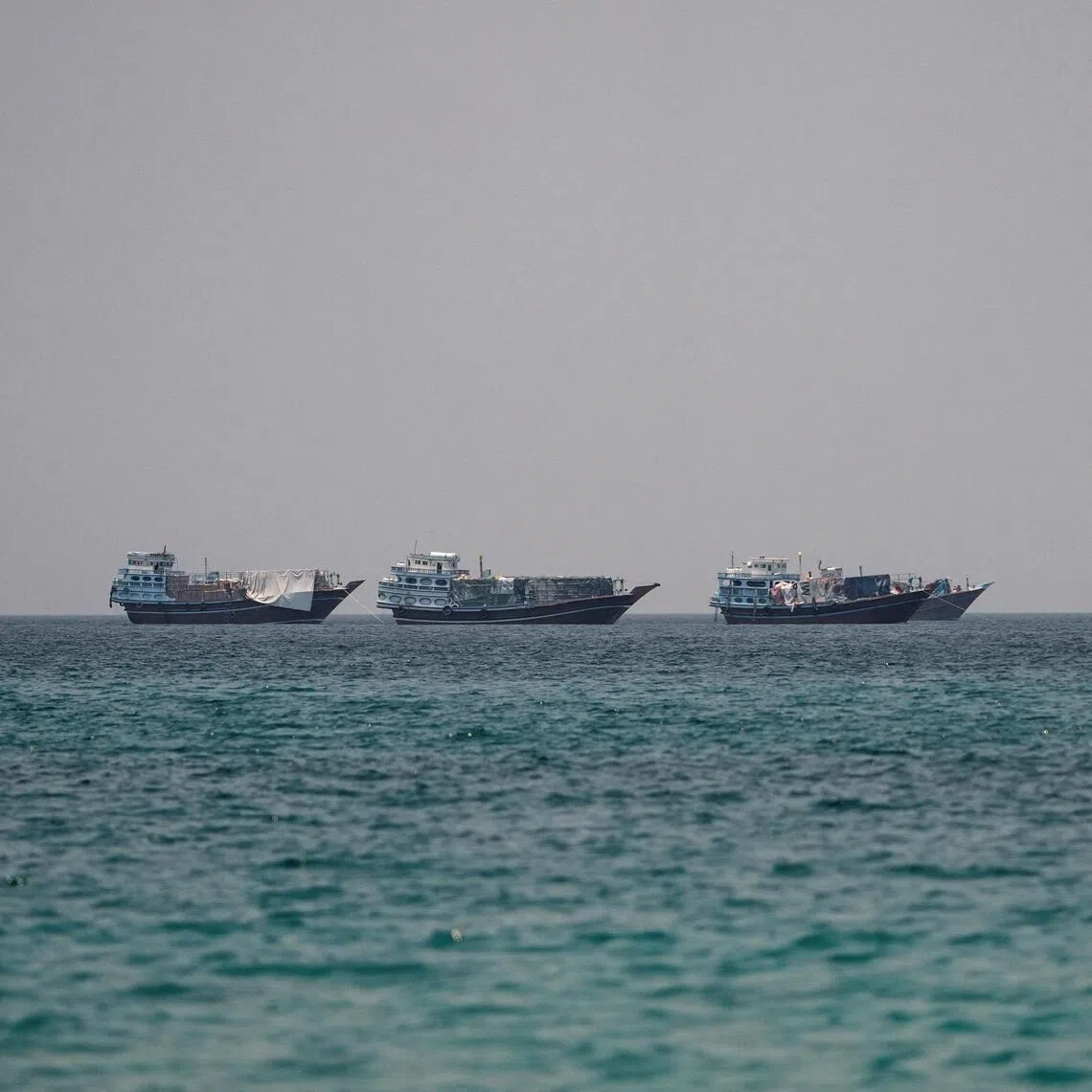 Vessels at the Strait of Hormuz, as seen from Musandam, Oman, July 1, 2026. REUTERS/Stringer