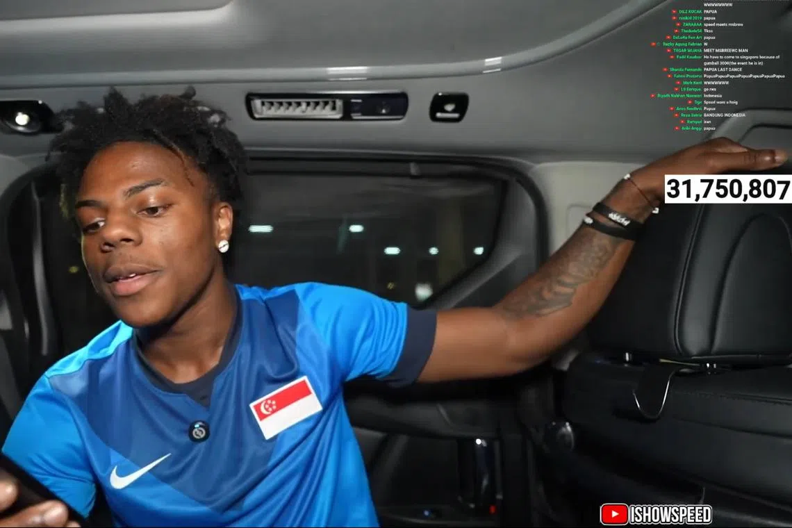 In a livestream that started at about 3.40pm IShowSpeed is shown wearing a blue Singapore football jersey in a moving vehicle.