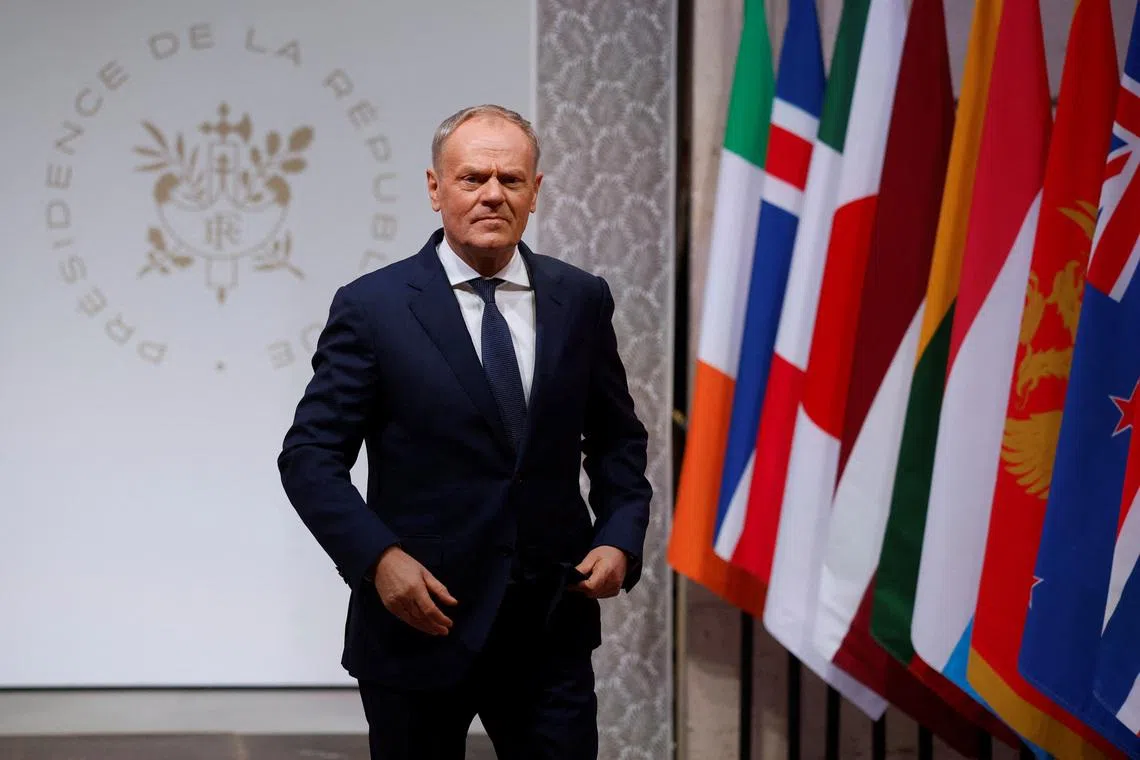 Polish Prime Minister Donald Tusk arrives for the Coalition of the Willing summit at the Elysee Palace in Paris, France January 6, 2026. YOAN VALAT/Pool via REUTERS