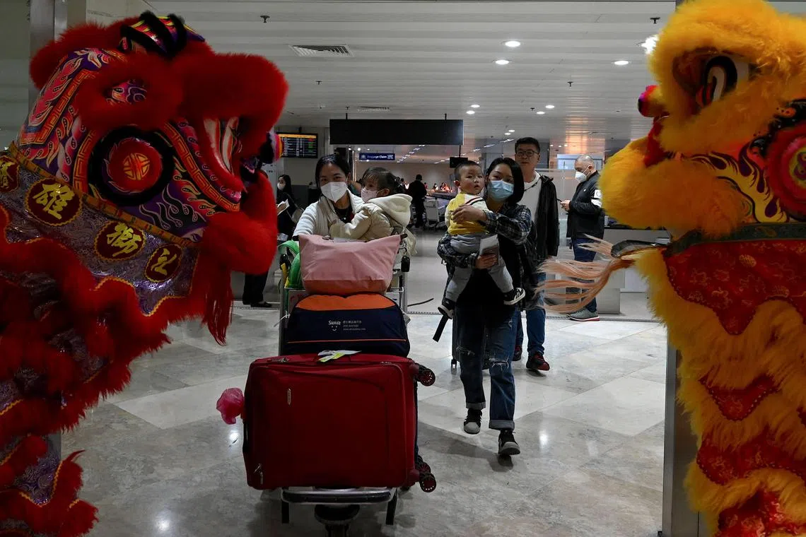 Dragon dancers welcome visitors from China as they arrive at the Philippines' international airport in the capital Manila.
