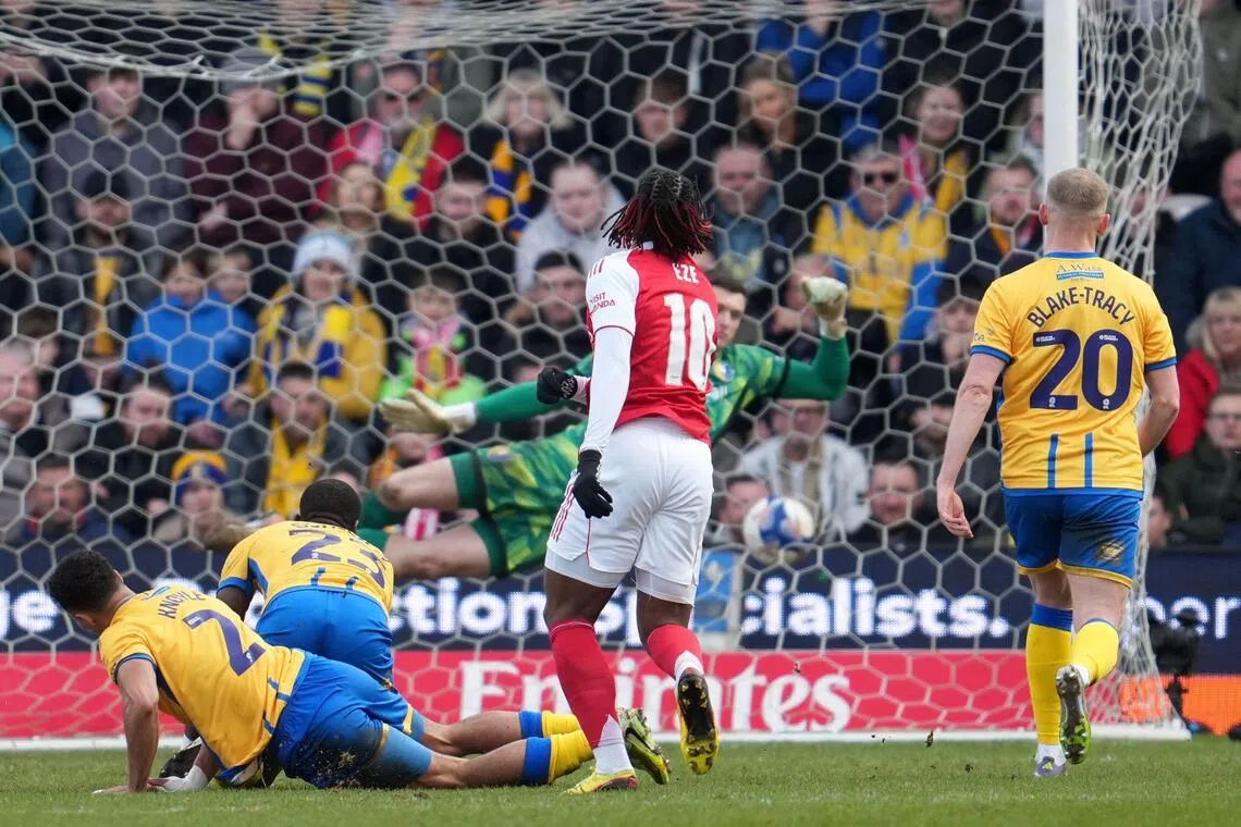 Arsenal's English midfielder Eberechi Eze scoring the winner in the 2-1 FA Cup fifth-round triumph over Mansfield Town at Field Mill on March 7, 2026. 