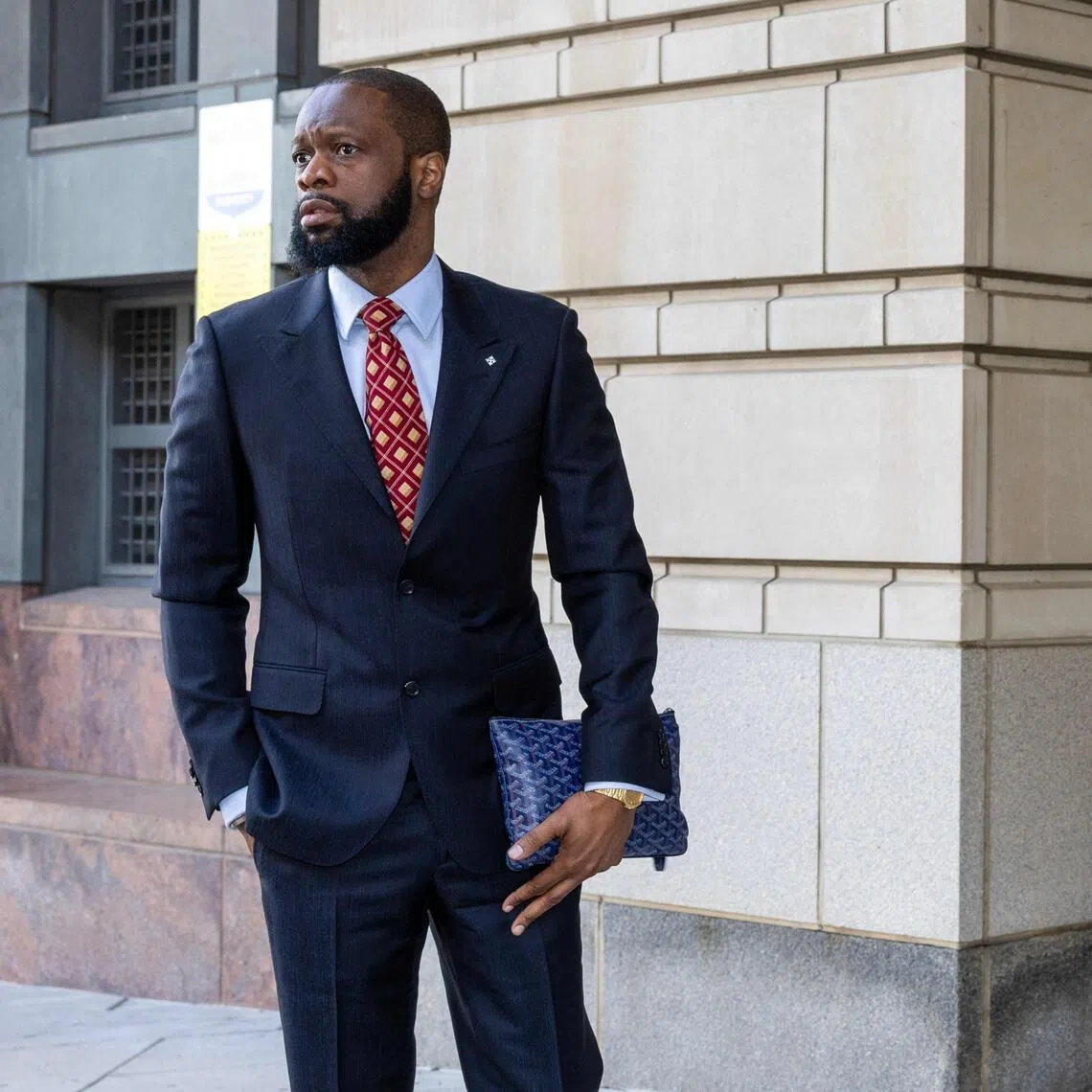 A 2023 photo shows former Fugees rapper Pras Michel arriving at Washington, DC court for his conspiracy trial.