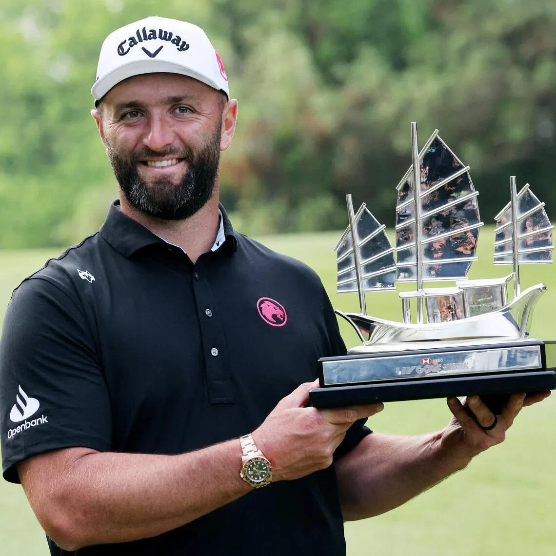Legion XIII's Jon Rahm posing with his trophy after winning LIV Golf Hong Kong on March 8.
