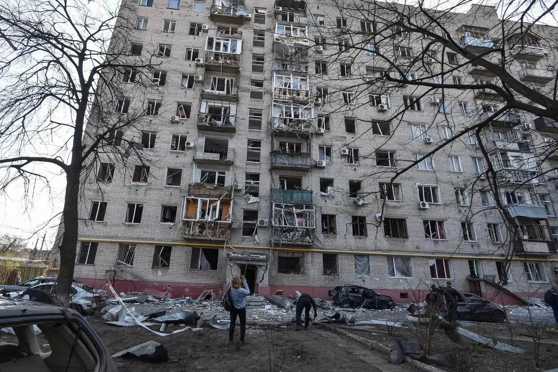 A view shows an apartment building hit by a Russian drone strike, amid Russia's attack on Ukraine, in Dnipro, Ukraine March 29, 2025. REUTERS/Mykola Synelnykov