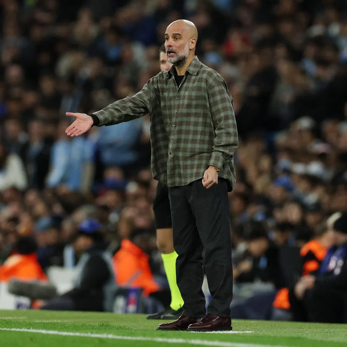 Soccer Football - UEFA Champions League - Round 16 - Second Leg - Manchester City v Real Madrid - Etihad Stadium, Manchester, Britain - March 17, 2026 Manchester City manager Pep Guardiola REUTERS/Phil Noble