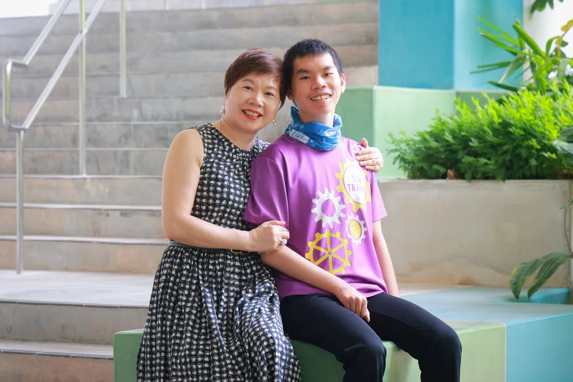 Wu Ping (left) and her son Sherman, who has an intellectual disability, deafness, cerebral palsy and epilepsy.