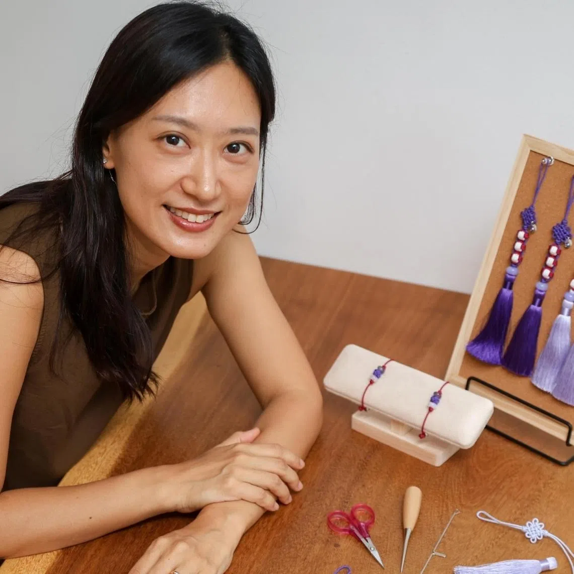 South Korean Suna Kim sells handmade BTS-inspired norigae, a traditional Korean ornamental accessory, and bracelets from her home. 