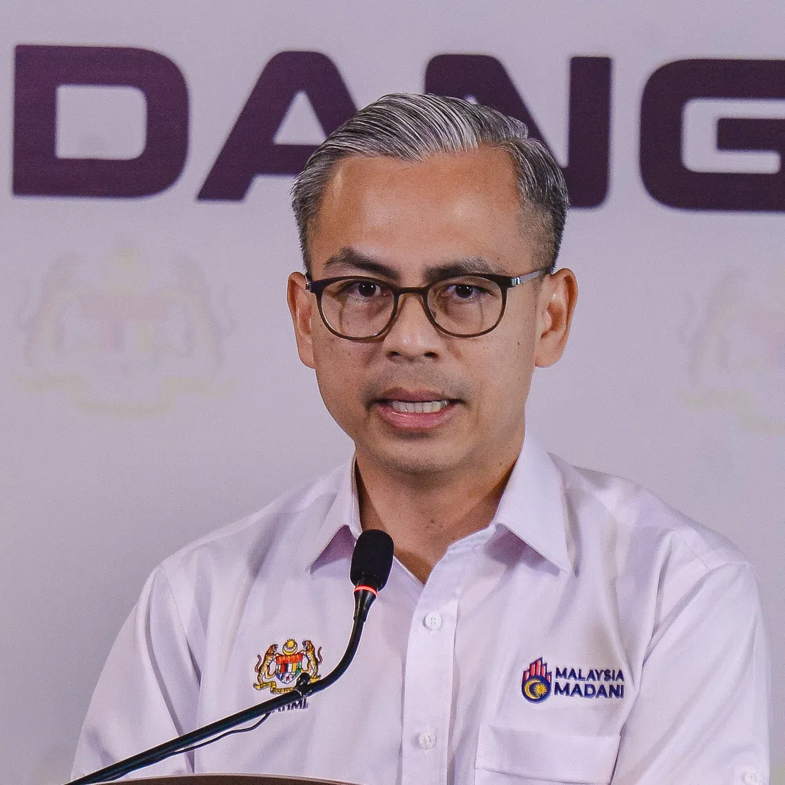 Fahmi Fadzil said a fire had spread to a Malaysian-owned plantation but did not originate from there.