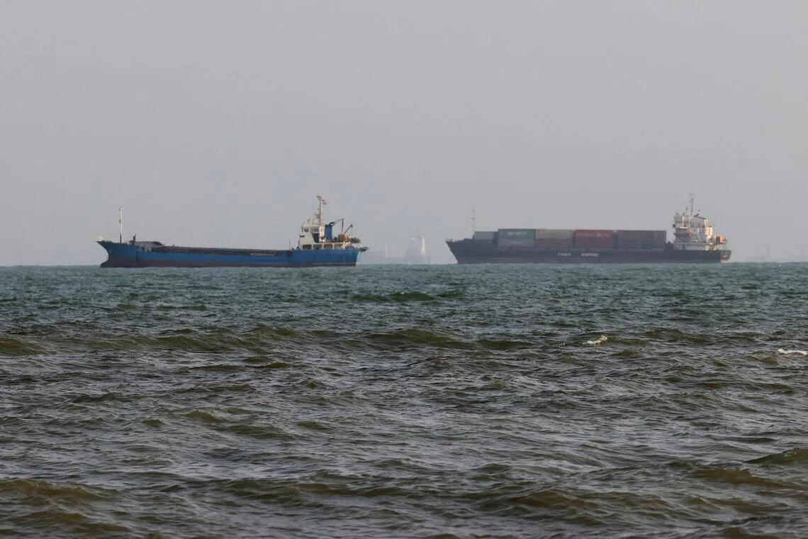 Vessels are seen in the Strait of Hormuz, off the port city of Bandar Abbas in southern Iran, on Aug 10.