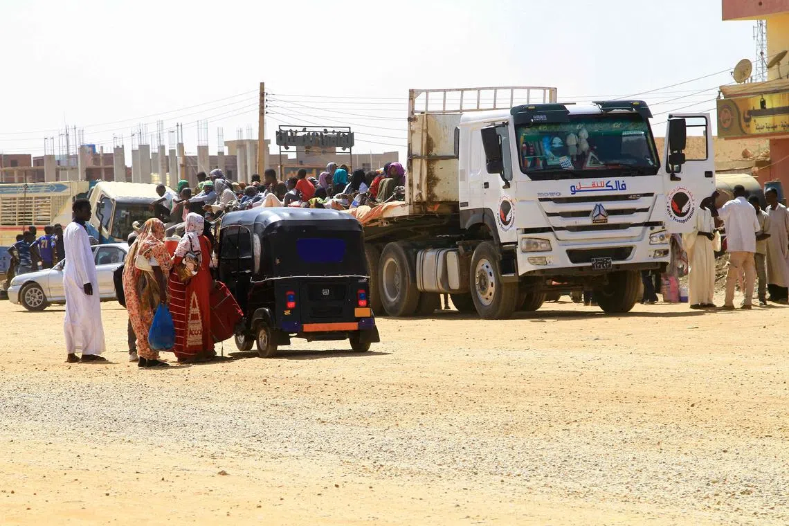 People flee the southern part of Khartoum as street battles between the forces of two rival Sudanese generals contine.