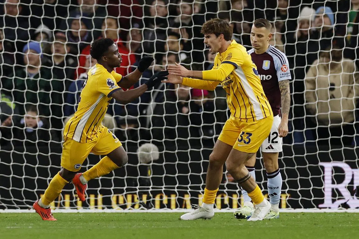 Brighton & Hove Albion's Tariq Lamptey celebrates scoring their second goal with Matt O'Riley.