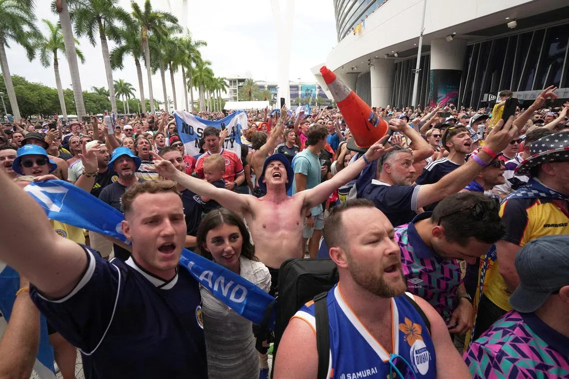 Soccer Football - FIFA World Cup 2026 - Scotland's Tartan Army march to LoanDepot Park - LoanDepot Park, Miami, Florida, U.S. - June 22, 2026 Scotland fans outside LoanDepot Park after marching to the stadium for the Miami Marlins Major League Baseball game against Texas Rangers IMAGN IMAGES via Reuters/Jim Rassol
