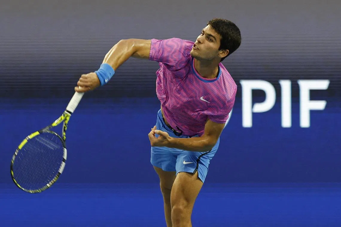 Carlos Alcaraz serving against Lorenzo Musetti on day nine of the Miami Open.