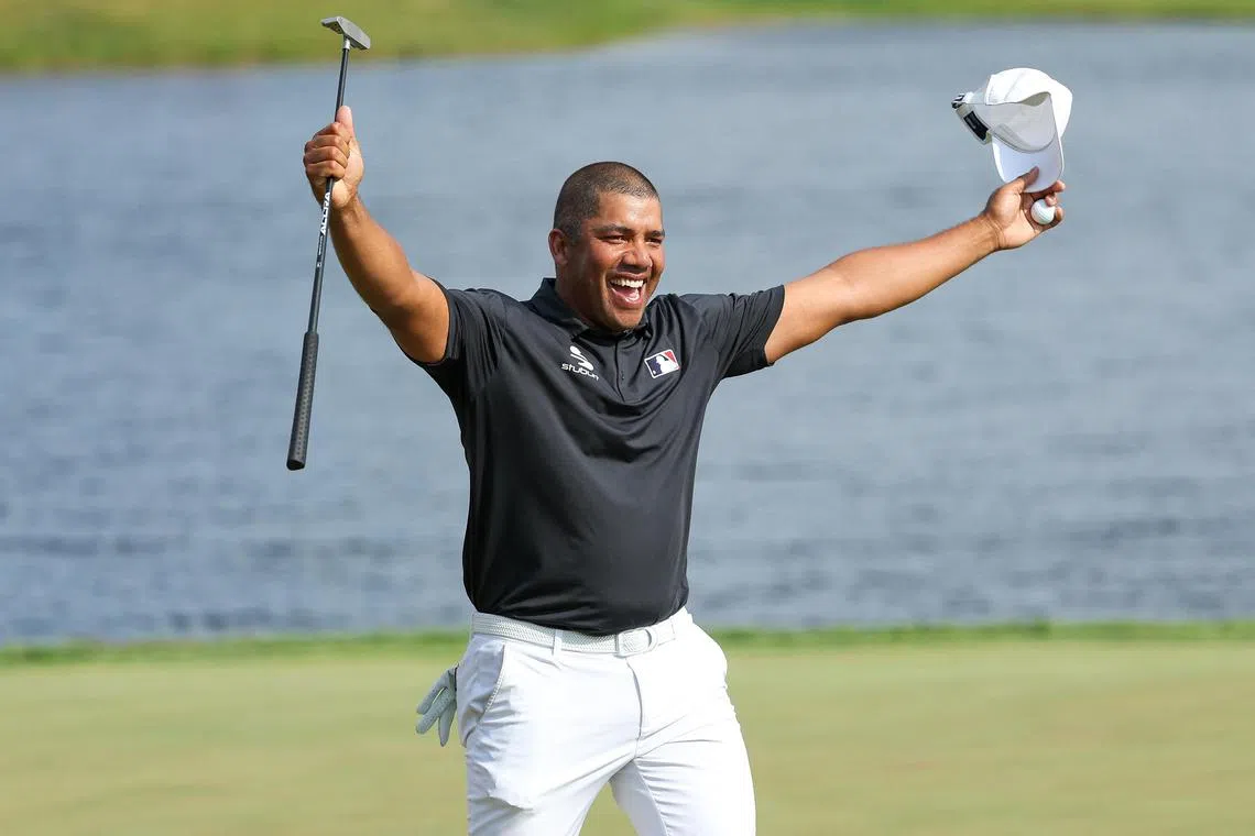 Jhonattan Vegas celebrating after winning the 3M Open golf tournament in Blaine, Minnesota, on July 28.