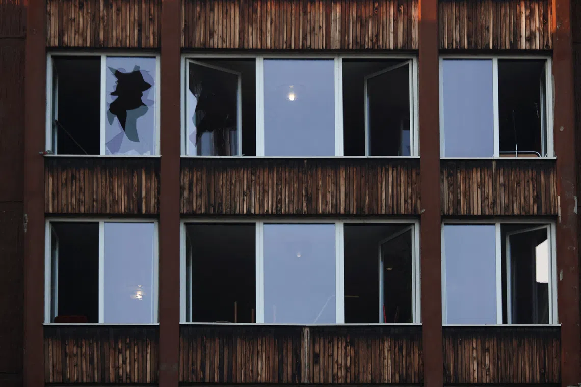 Damaged windows after a fire at an elderly people's home in the town of Tuzla, Bosnia and Herzegovina, November 5, 2025. REUTERS/Amel Emric