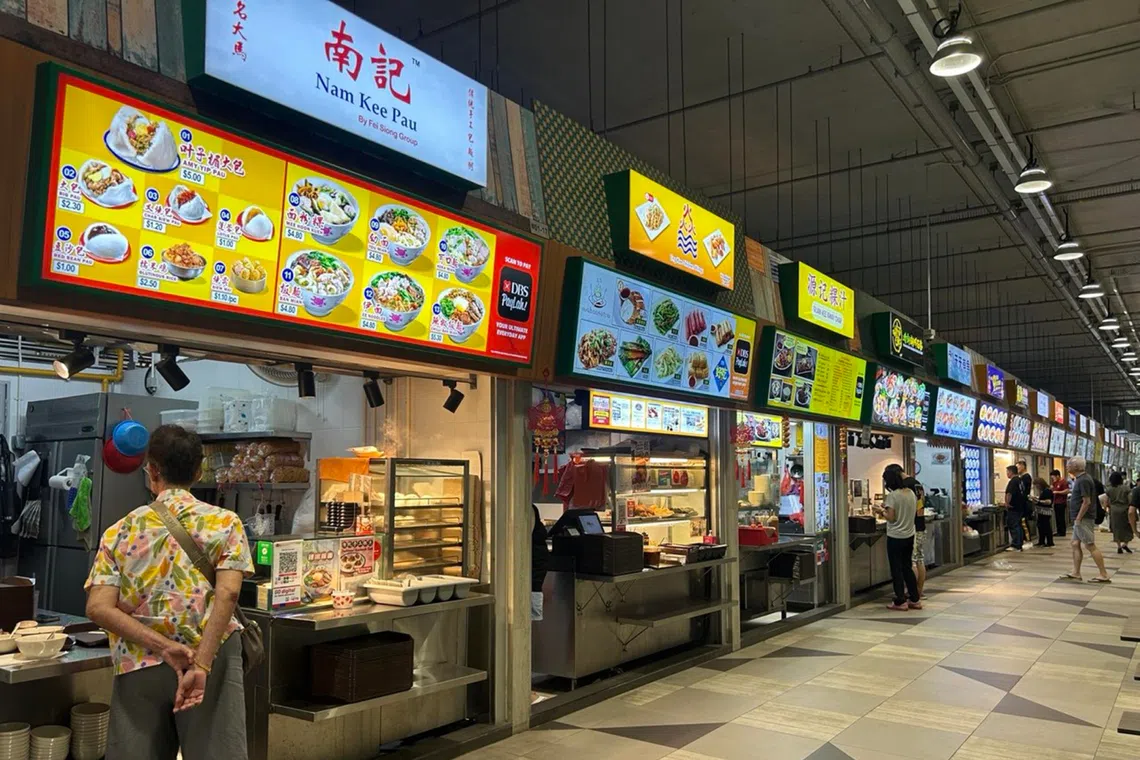 Popular food brands are among the stalls at Woodleigh Village Hawker Centre.