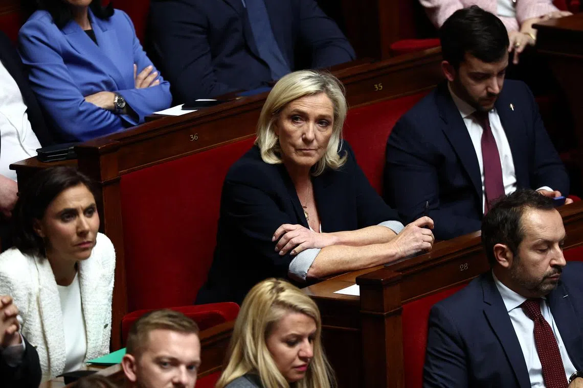 Marine Le Pen (centre) attending a session of the National Assembly - France's lower house of Parliament - in Paris on April 1.