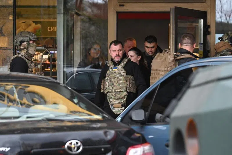 Two officers suspended in Ukraine over claims they fled Kyiv shooting