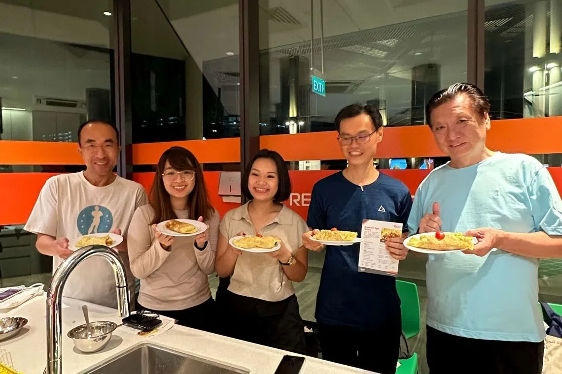 ActiveSG exercise and nutrition workshop, people holding plates of food 
