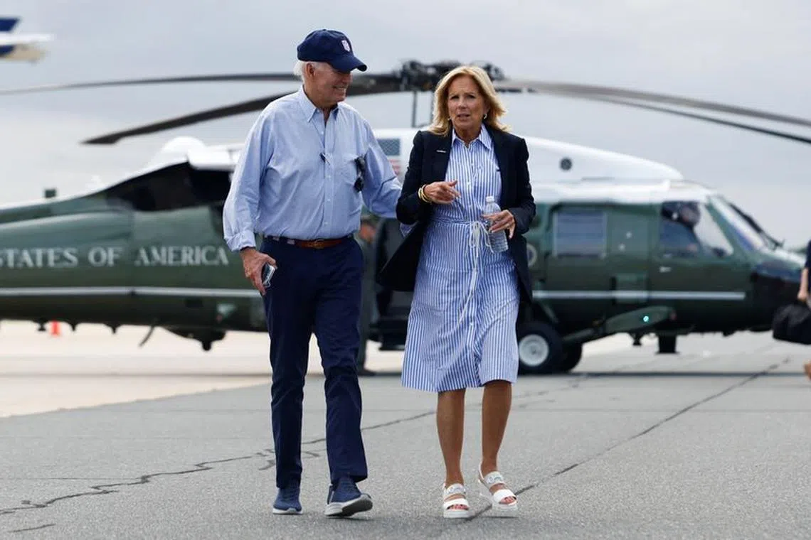 U.S. President Joe Biden and first lady Jill Biden walk to board Air Force One as they depart after touring Florida Hurricane Idalia storm destruction, in Gainesville, Florida, U.S., September 2, 2023.  REUTERS/Evelyn Hockstein/File Photo