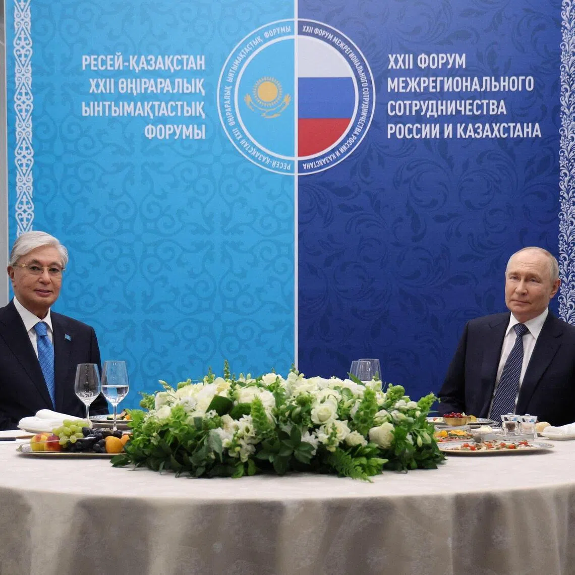 Kazakhstan President Kassym-Jomart Tokayev (left) meeting his Russian counterpart Vladimir Putin in Omsk, Russia, on July 25.