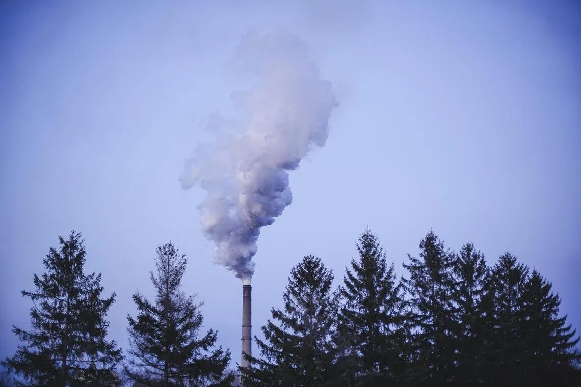FILE -- Steam escapes from the smokestack at the coal-fired power plant, which shut down in 2020, in Barker, N.Y., March 5, 2020. The Biden administration on Thursday, May 11, 2023, announced the first regulations to limit greenhouse pollution from existing power plants, capping an unparalleled string of climate policies that, taken together, could substantially reduce the nationÕs contribution to global warming. (Libby March/The New York Times)