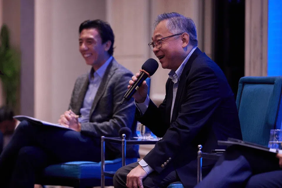 Acting Minister for Transport Jeffrey Siow (left) and Deputy Prime Minister Gan Kim Yong speak at a seminar organised by the Singapore Business Federation on Sept 9.