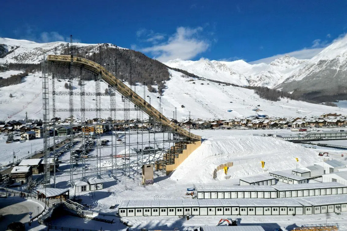 FILE PHOTO: A drone view shows the big ski jump in the snow park in Livigno, which will host all Snowboard and Freestyle Skiing events, including disciplines like Halfpipe, Slopestyle, Big Air, Ski Cross, Snowboard Cross, Moguls, Aerials, and Parallel Giant Slalom as part of the Milano Cortina Winter Olympic games in Italy, January 9, 2026. REUTERS/Yara Nardi/File Photo