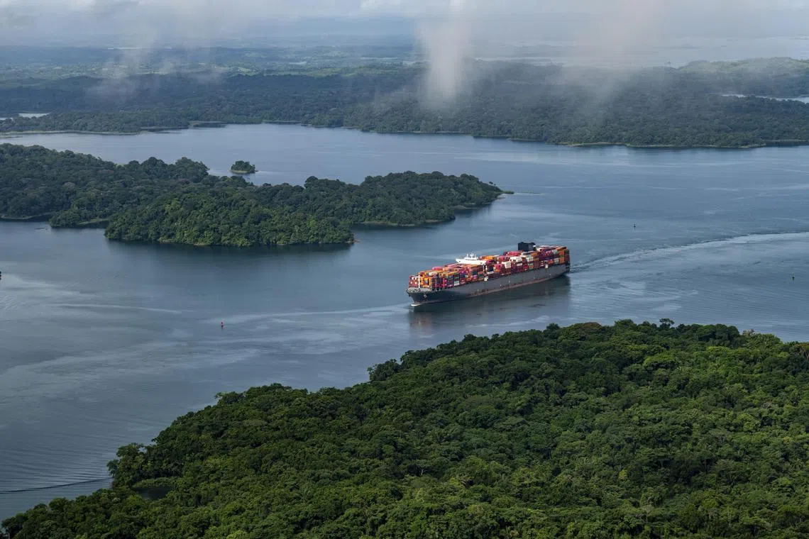 FILE Ñ A cargo ship crosses Lake Gatœn, the artificial reservoir that is the centerpiece of the Panama Canal system, in Panama on July 10, 2024. The canalÕs two biggest ports are operated by a Hong Kong company with global reach. The Trump administration calls the arrangement a Chinese threat to U.S. security. (Federico Rios/The New York Times)