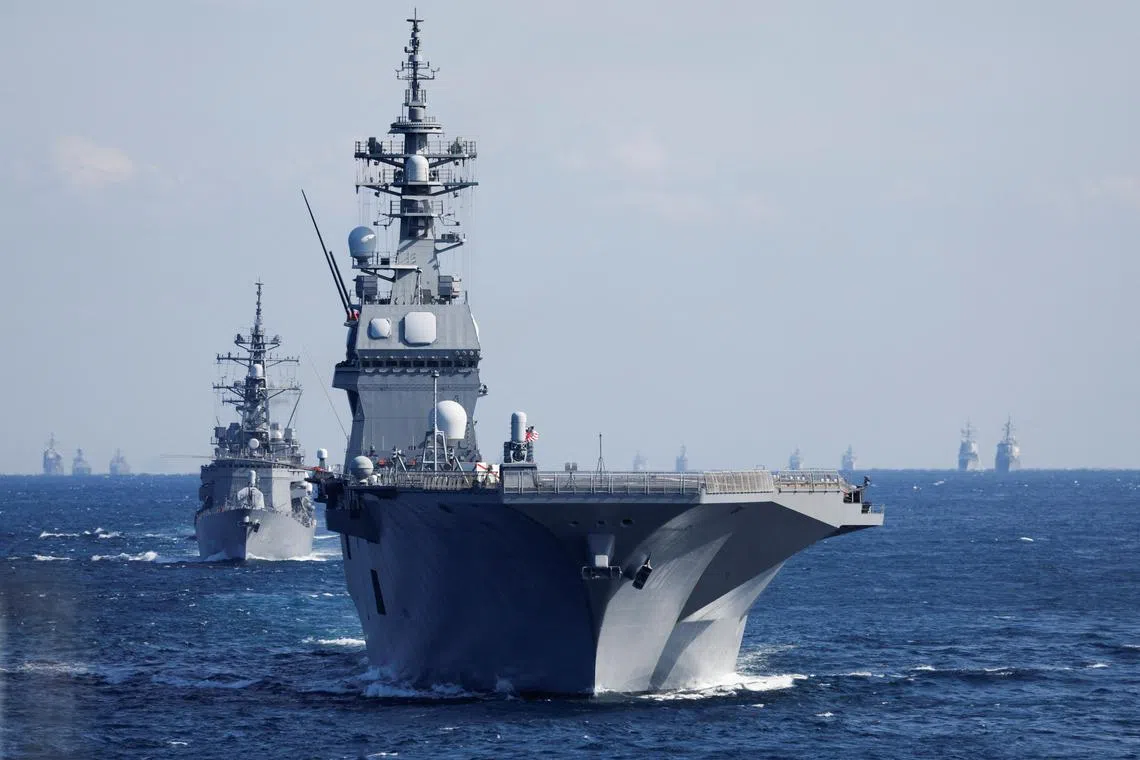 The JS Hyuga, a helicopter destroyer of the Japan Maritime Self-Defence Force, leading the fleet at the International Fleet Review in Sagami Bay on Nov 6, 2022.