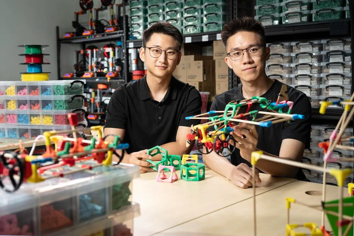 Mr Adam Huh Dam (left) and Mr Chong Ing Kai with a creation made with a Stick ‘Em kit.