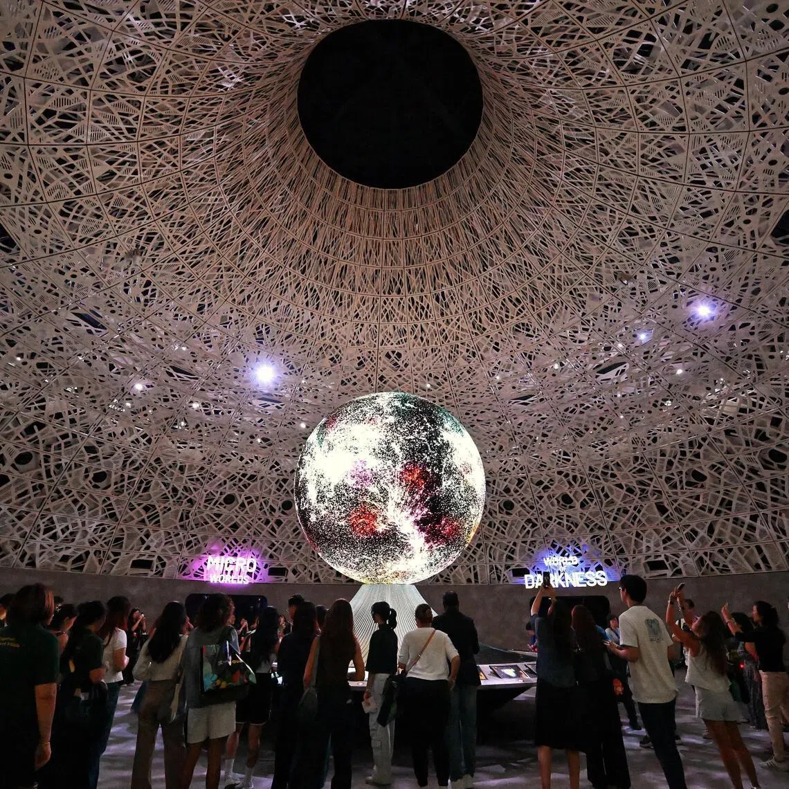 ST20260223_202610200686 Kua Chee Siong/ pixexploria23/ 

?The Planet Awakens?, Exploria?s signature light show spectacle at Our Interconnected World, welcomes visitors as they begin their discovery through the different worlds.

The Mandai Wildlife Reserve launches Exploria, Southeast Asia?s largest indoor, nature-themed multimedia attraction at the Green Canvas, Mandai Wildlife East, on Feb 23, 2026. 

Spanning 10,000 sqm, Exploria consists of five immersive worlds?Realm of the Giants, World of Darkness, Extreme Frontiers, Infinite Wonderland and Micro Worlds.

Through digital projections and interactive spaces across five imaginative worlds, Exploria is designed to transport visitors into nature's most extraordinary environments from high-altitude landscapes to the tiniest ecosystems. 

Visitors can discover how animals live in extreme conditions, learn about the delicate balance of ecosystems, and even get up close to nature?s smallest inhabitants ? like bees in their hives ? all in a way that would be otherwise inaccessible.

Exploria reveals nature?s hidden marvels, showing how life forms and ecosystems are interconnected beyond what can be seen outdoors.