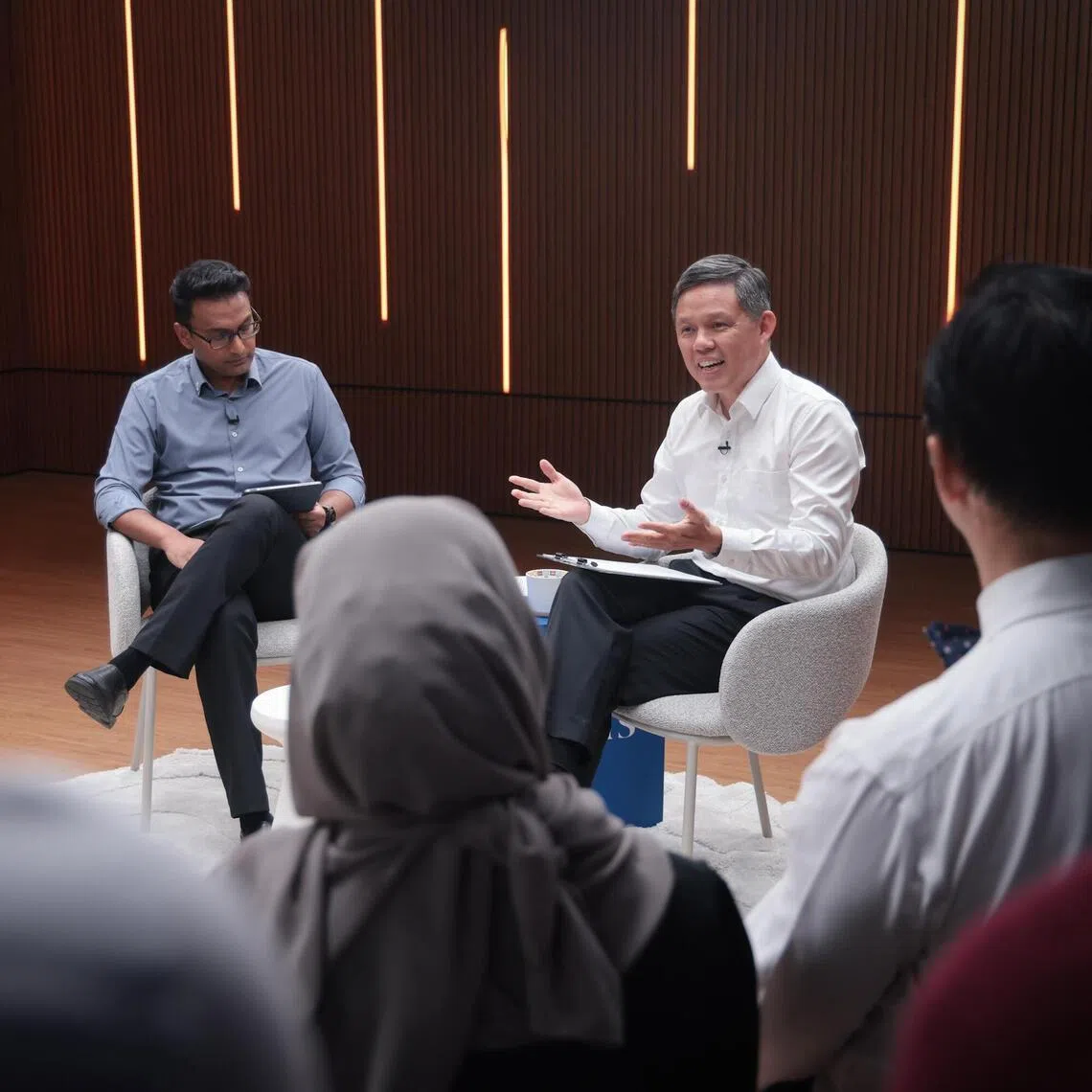 Defence Minister Chan Chun Sing speaking at a June 24 dialogue moderated by The Straits Times’ deputy opinion editor Mubin Saadat (left) and attended by 25 people, including contributors to the paper’s Forum section.