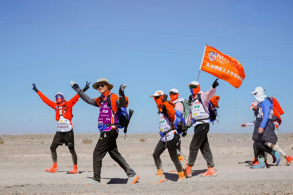 Members of the NUS team trekking through the Gobi desert in Oct 2024.