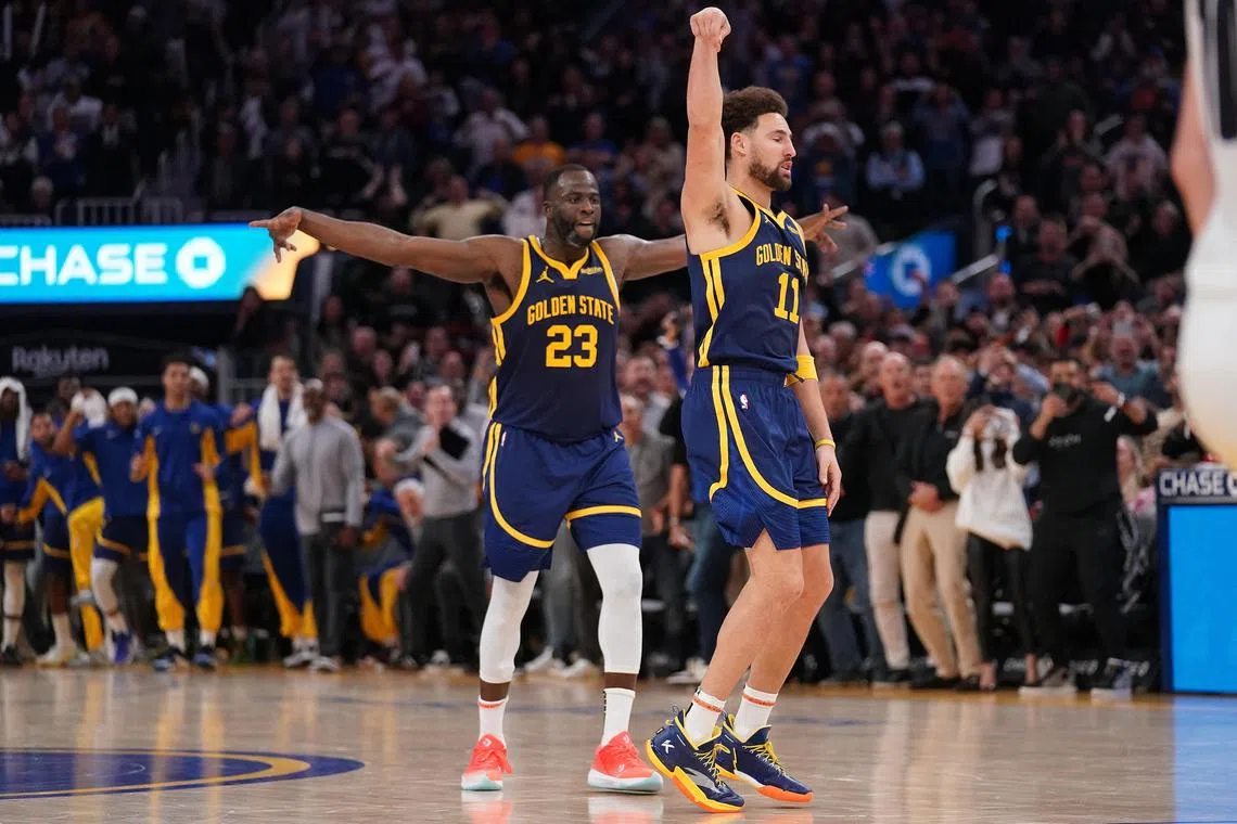 Golden State Warriors guard Klay Thompson following through on a shot after making a basket with less than one second remaining against the Sacramento Kings in the fourth quarter at the Chase Centre to win the game 102-101 on Wednesday.