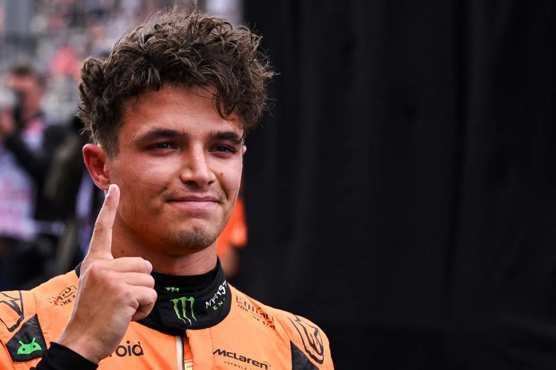 McLaren's British driver Lando Norris reacts after claiming pole position at the qualifying session for the Formula One Dutch Grand Prix on Aug 24.