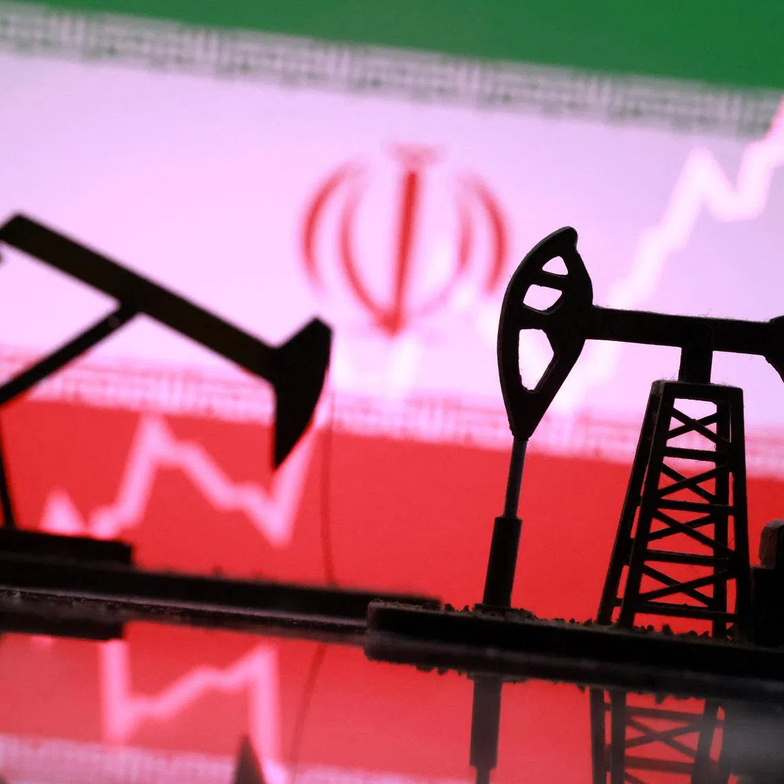 3D-printed oil pump jacks, Iranian flag, and a rising stock graph appear in this illustration taken March 2, 2026. REUTERS/Dado Ruvic/Illustration